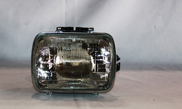 Jeep Cherokee/Comanche/Wagoneer/Wrangler Driver Side Headlight Assembly W/Quad Lamps Low Beam Includes Housing/Rim/Sealed Beam Sealed Beam - CH2500103
