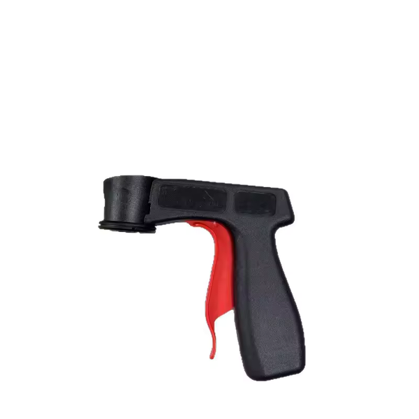 One black aerosol spray-can handle with a red trigger