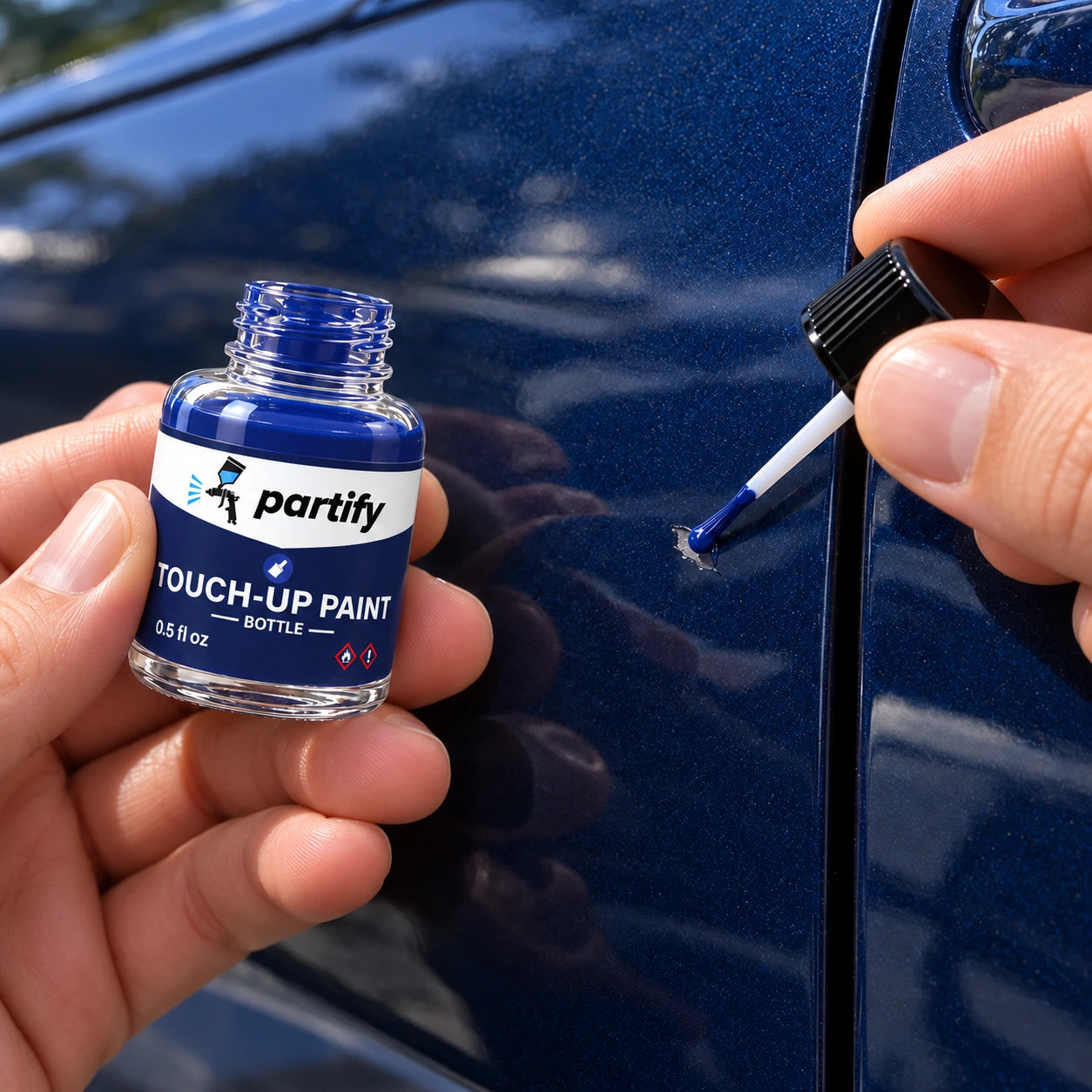 Applying paint to a small chip using the bottle’s single cap-mounted brush