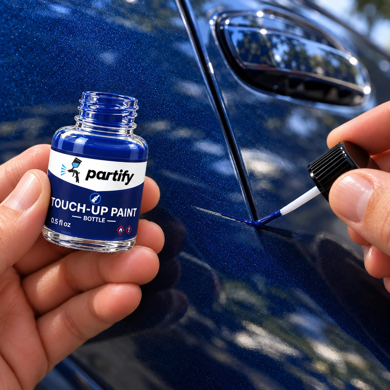 Applying a thin brush stroke inside a short scratch with Partify bottle paint