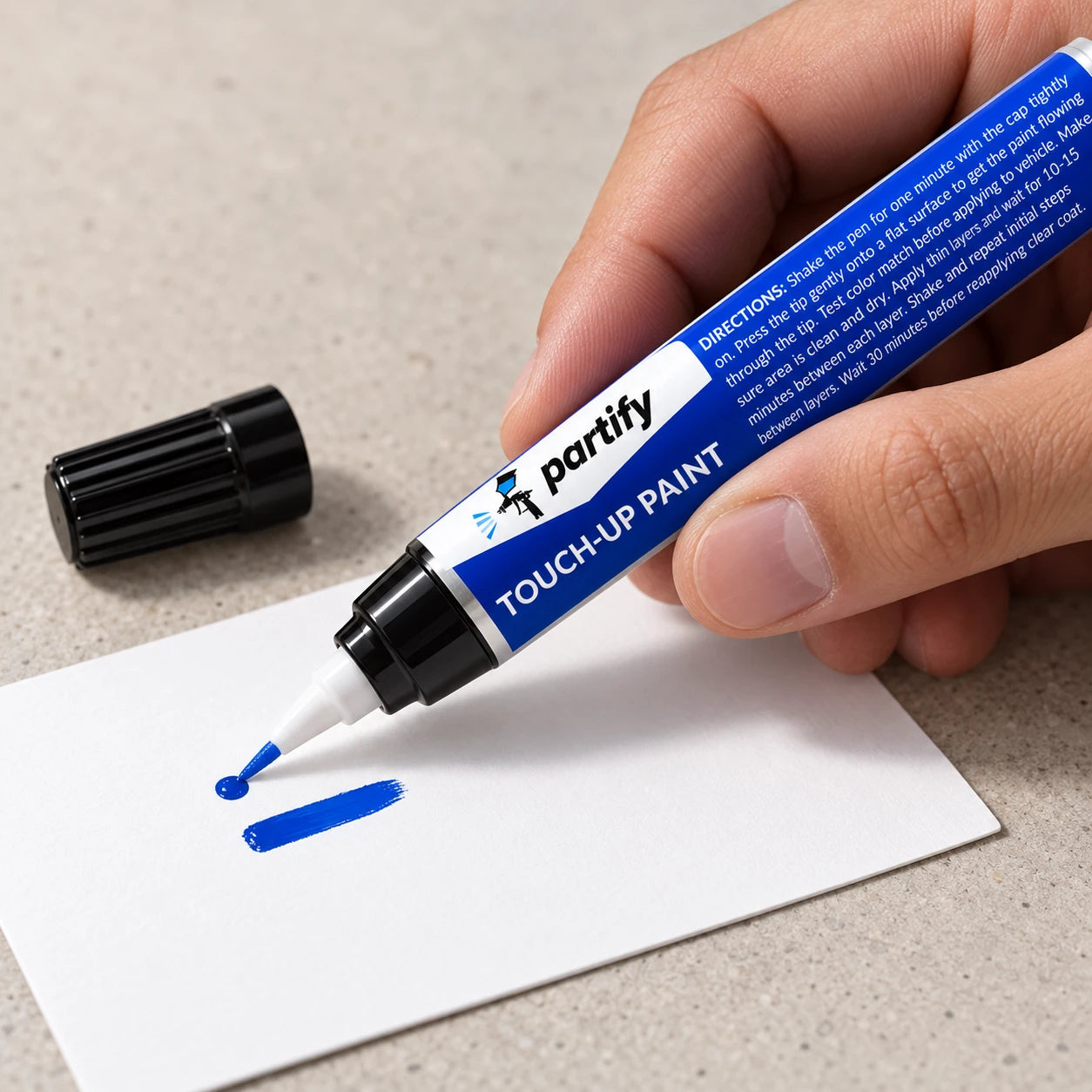 Priming the current Partify paint pen on a white test card