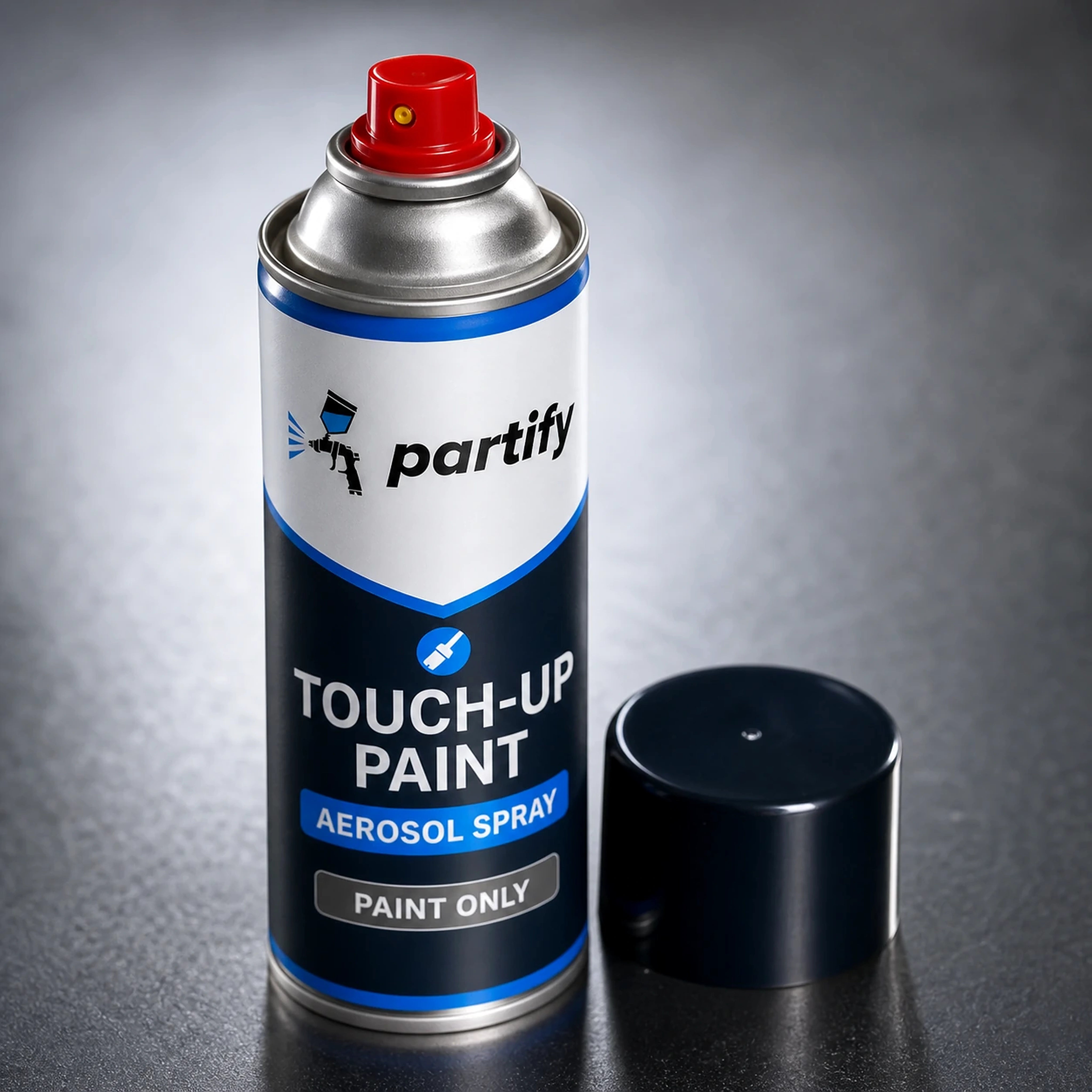 Close studio view of the real Partify touch-up aerosol can, metal shoulder, and precision actuator