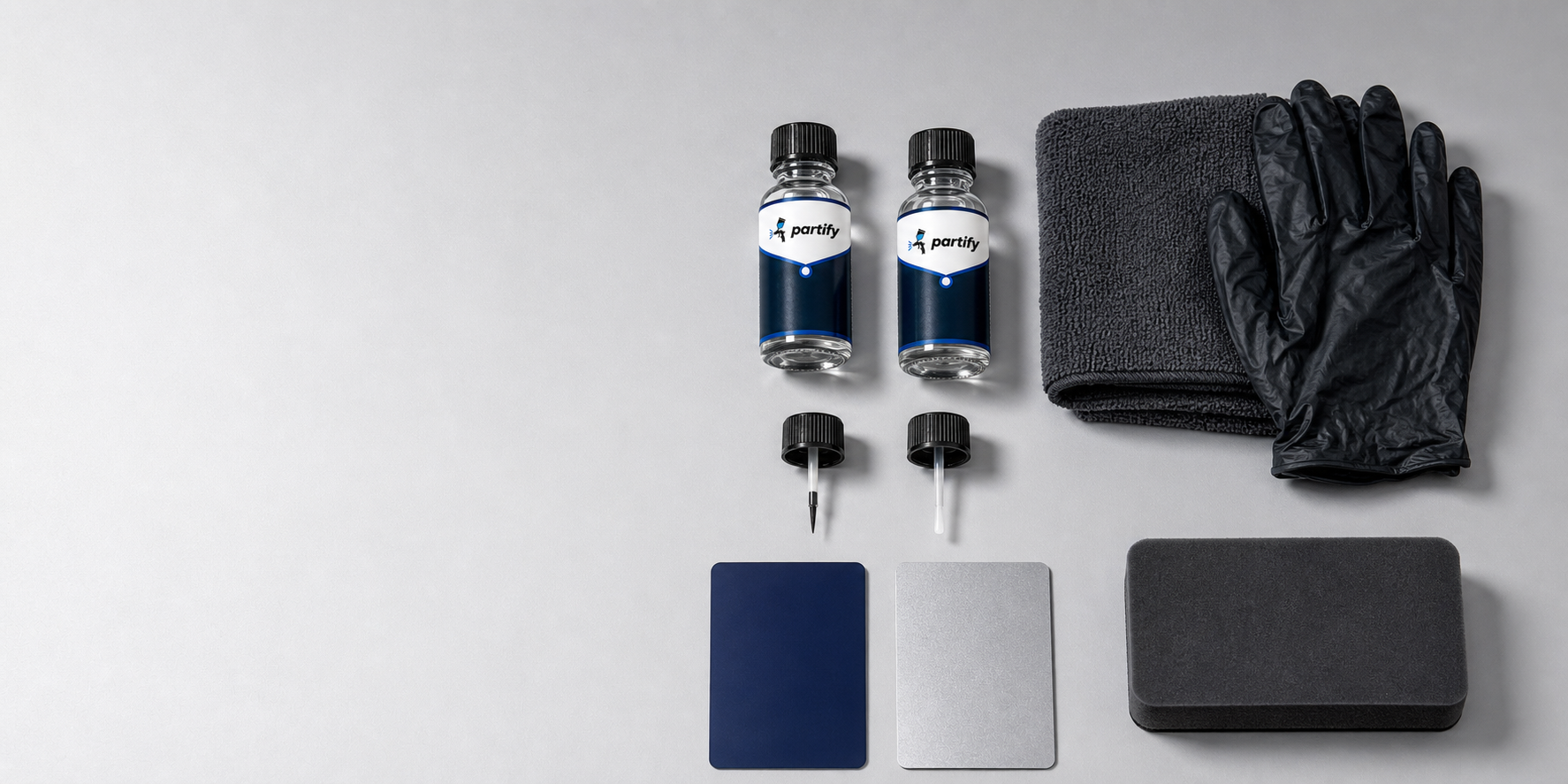 Partify touch-up bottle system with paint bottles, applicators, towel, gloves, and paint test cards